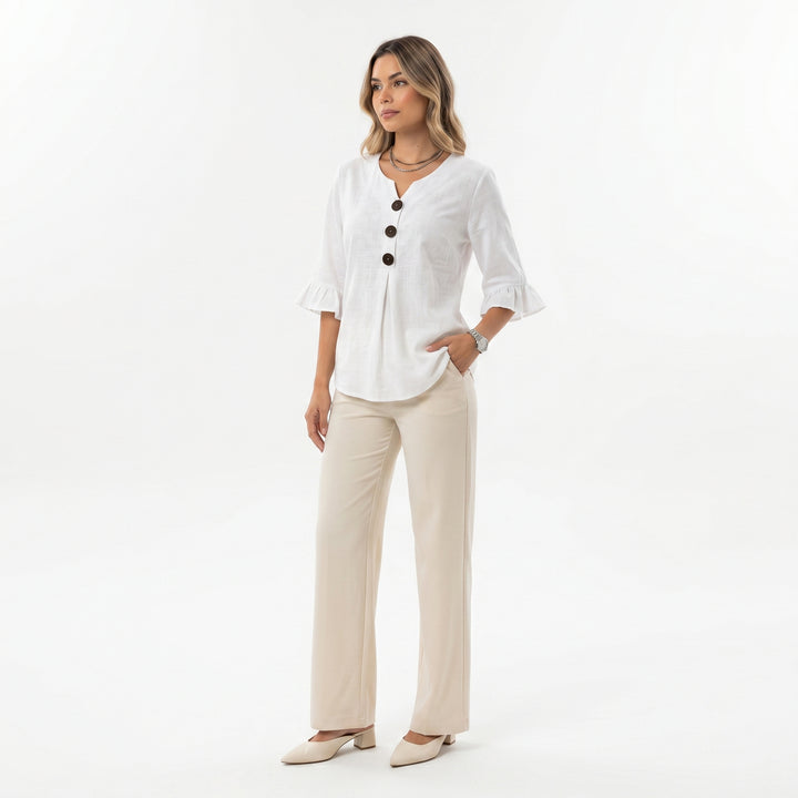 Blusa Sofía de algodón-lino lisa con botones de madera y volantes